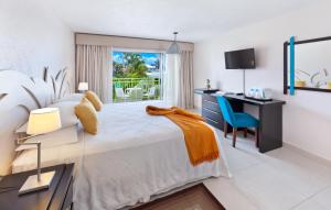 Cama ou camas em um quarto em Blue Horizon Hotel