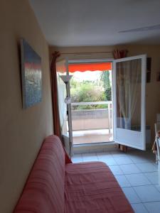 Postel nebo postele na pokoji v ubytování L’Heure Bleue