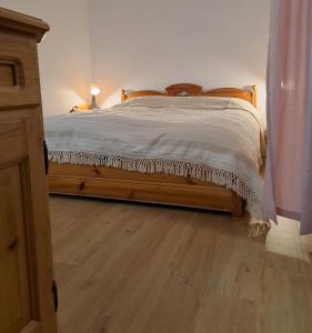 Katil atau katil-katil dalam bilik di Casa Vacanze Bianca Sella Nevea