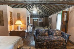 Postel nebo postele na pokoji v ubytování Casa Rural La Capellania + 37 fotografií