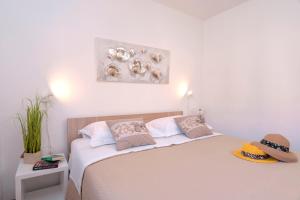 Posteľ alebo postele v izbe v ubytovaní Apartment Katarina Vrboska