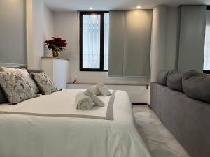 Postel nebo postele na pokoji v ubytování Urban Loft Córdoba