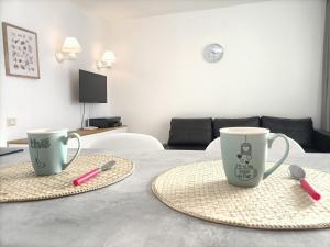 Televízia a/alebo spoločenská miestnosť v ubytovaní CALIMA Lodge Corralejo