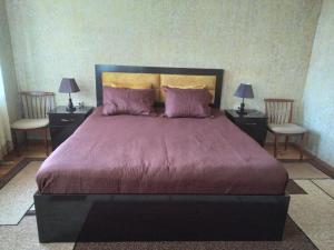 Postel nebo postele na pokoji v ubytování Royal Hotel