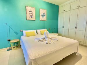 Postel nebo postele na pokoji v ubytování Tropical Rest Apartment