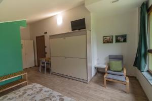 TV a/nebo společenská místnost v ubytování B&B Alla Roggetta