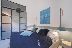 Postel nebo postele na pokoji v ubytování Dimora Lopez B&B