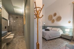 Koupelna v ubytování Dimora Lopez B&B + 16 fotografií