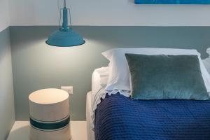 Postel nebo postele na pokoji v ubytování Dimora Lopez B&B