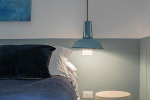Postel nebo postele na pokoji v ubytování Dimora Lopez B&B