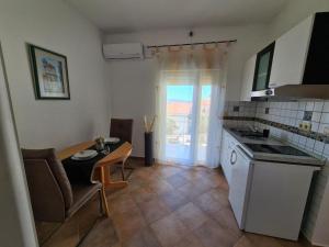 Kuchyň nebo kuchyňský kout v ubytování Villa Neda + 27 fotografií