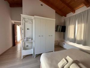 Posteľ alebo postele v izbe v ubytovaní NG Guest House il RIS