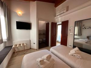 Posteľ alebo postele v izbe v ubytovaní NG Guest House il RIS