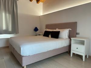 Posteľ alebo postele v izbe v ubytovaní NG Guest House il RIS