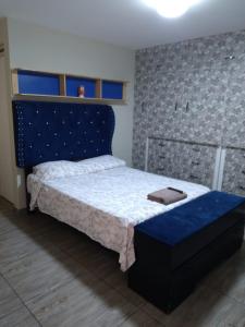 Cama o camas de una habitación en Hospedaje Ocean Glip's