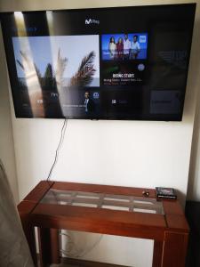 TV a/nebo společenská místnost v ubytování Condominio Espacio Uno Fco de Aguirre
