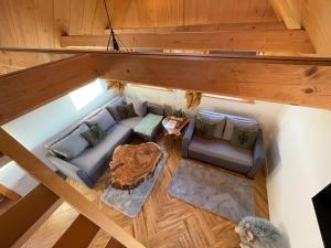 an overhead view of a living room in a log cabin at Smrekowe Zacisze in Bańska Niżna +20 photos