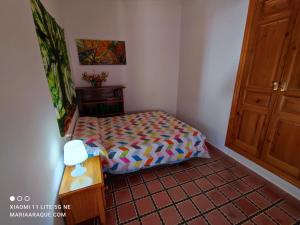 Łóżko lub łóżka w pokoju w obiekcie Casa Rural El Sendero