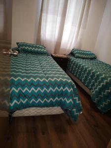 Postel nebo postele na pokoji v ubytování Condominio Espacio Uno Fco de Aguirre + 6 fotografií