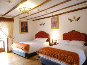 Letto o letti in una camera di Casona Corrales Hotel Boutique