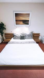 Postel nebo postele na pokoji v ubytování Hotel Algar