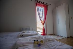 Giường trong phòng chung tại Ventum Luxury House Bjelasnica