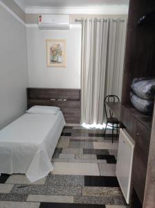 Postel nebo postele na pokoji v ubytování Lodi Express Hotel