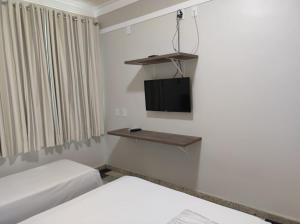 TV a/nebo společenská místnost v ubytování Lodi Express Hotel + 5 fotografií
