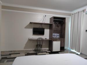 TV a/nebo společenská místnost v ubytování Lodi Express Hotel