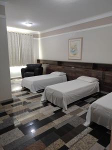 Postel nebo postele na pokoji v ubytování Lodi Express Hotel