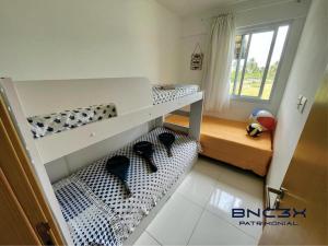 Katil atau katil-katil dalam bilik di Baixio - Residencial Ponta de Inhambupe +17 gambar