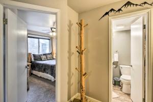 a room with a bathroom with a room with a bed at Walk to Main St and Chairlift Breckenridge Condo! in Breckenridge +21 photos