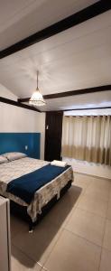 Postel nebo postele na pokoji v ubytování Flow Guest House