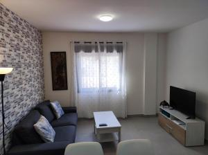 Televízia a/alebo spoločenská miestnosť v ubytovaní Remanso Urbano 2