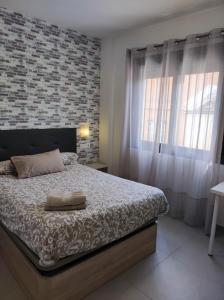Postel nebo postele na pokoji v ubytování Remanso Urbano 2