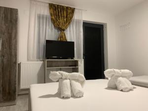 Postel nebo postele na pokoji v ubytování Casa David