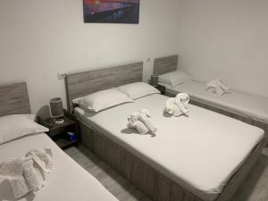 Postel nebo postele na pokoji v ubytování Casa David