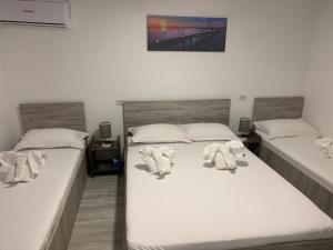 Postel nebo postele na pokoji v ubytování Casa David
