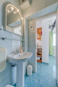 Koupelna v ubytování Pikolo Apartments Omiš + 37 fotografií