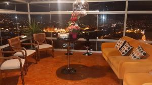 Posezení v ubytování Hotel Luna de Oro Cusco