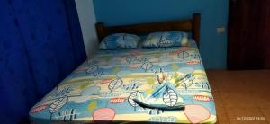 Llit o llits en una habitació de Hostel Marisol