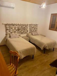 A bed or beds in a room at Chalet in campagna