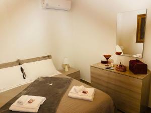 A bed or beds in a room at Chalet in campagna