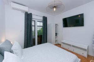 Fotografie z fotogalerie ubytování Apartments by the sea Podgora, Makarska - 20231 v Podgoře + 12 fotografií