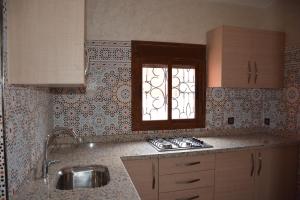 Kuchyň nebo kuchyňský kout v ubytování Ozoud high standing appartment