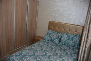 Postel nebo postele na pokoji v ubytování Ozoud high standing appartment