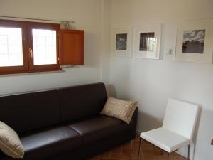 Część wypoczynkowa w obiekcie Tower Apartment in Tuscany near San Gimignano