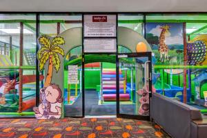 a childrens play area with a mural of a playground at Gawler Arms Hotel in Gawler