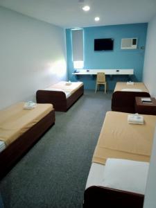 TV a/nebo společenská místnost v ubytování MADISON PARK HOTEL