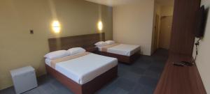 Postel nebo postele na pokoji v ubytování MADISON PARK HOTEL + 2 fotografie